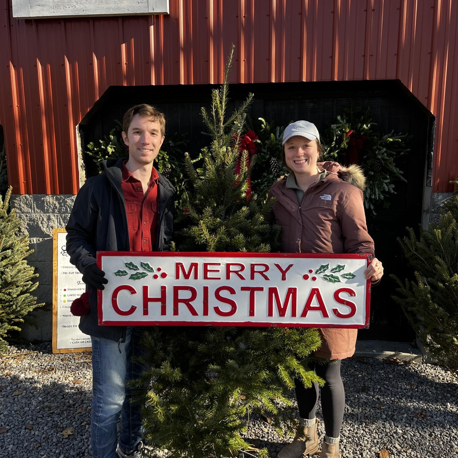Maddie and Ian cut down their first Christmas tree in December 2023 to decorate their house in Pittsburgh.