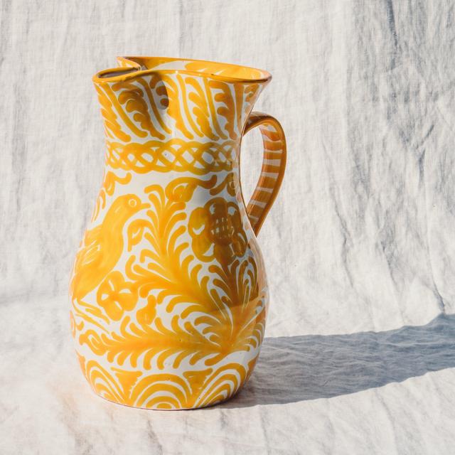 Large pitcher with hand painted designs