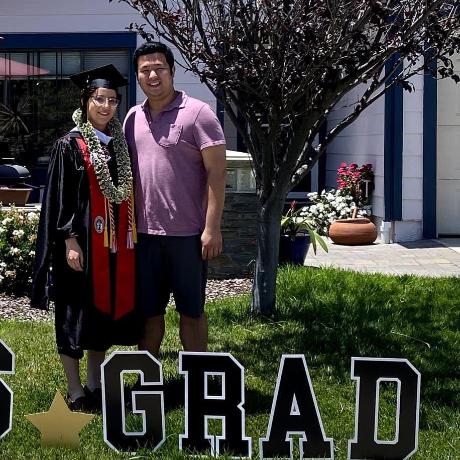 Celebrating Laura's MS graduation at home in 2020.