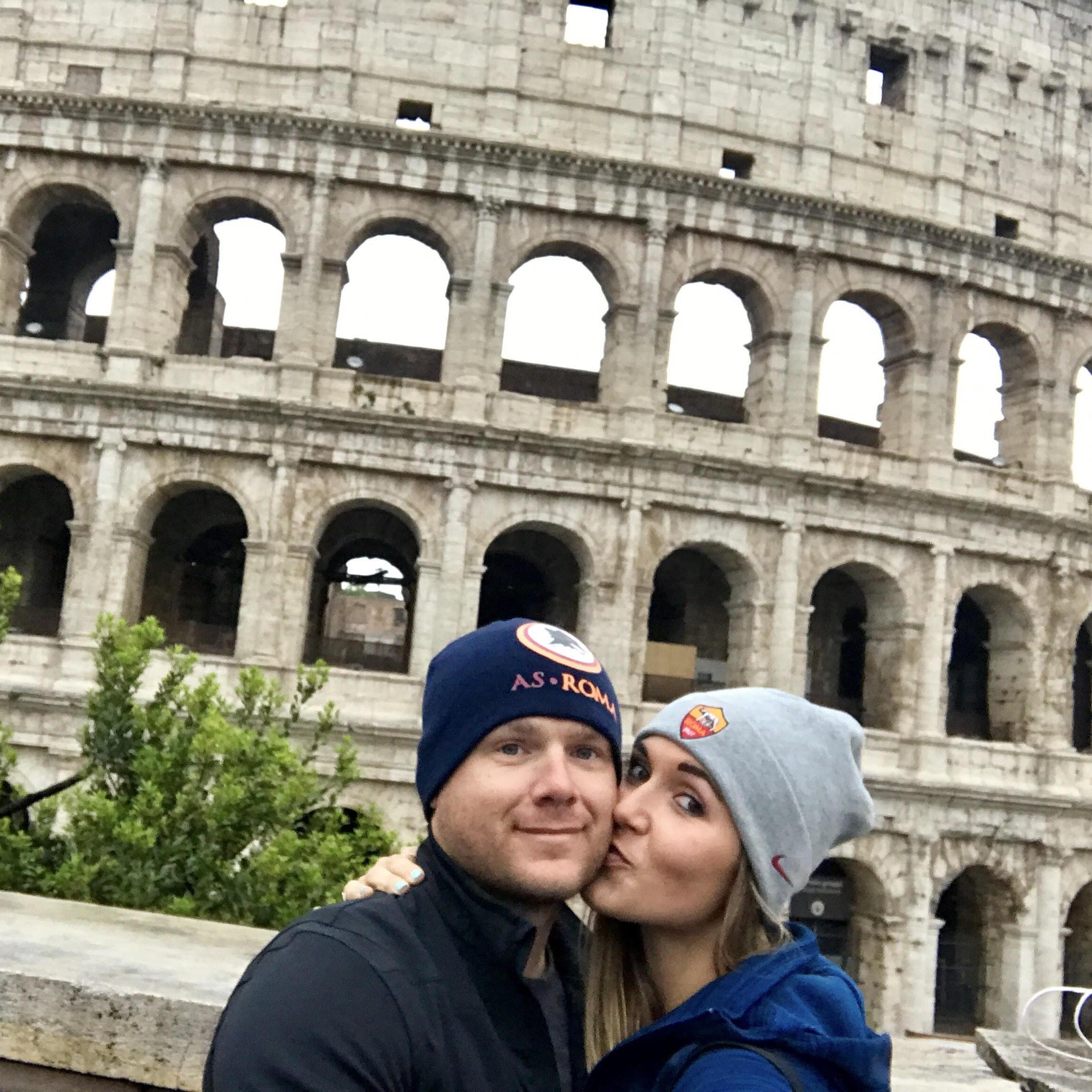 Rocking our new beanies at the Colloseum in Rome!