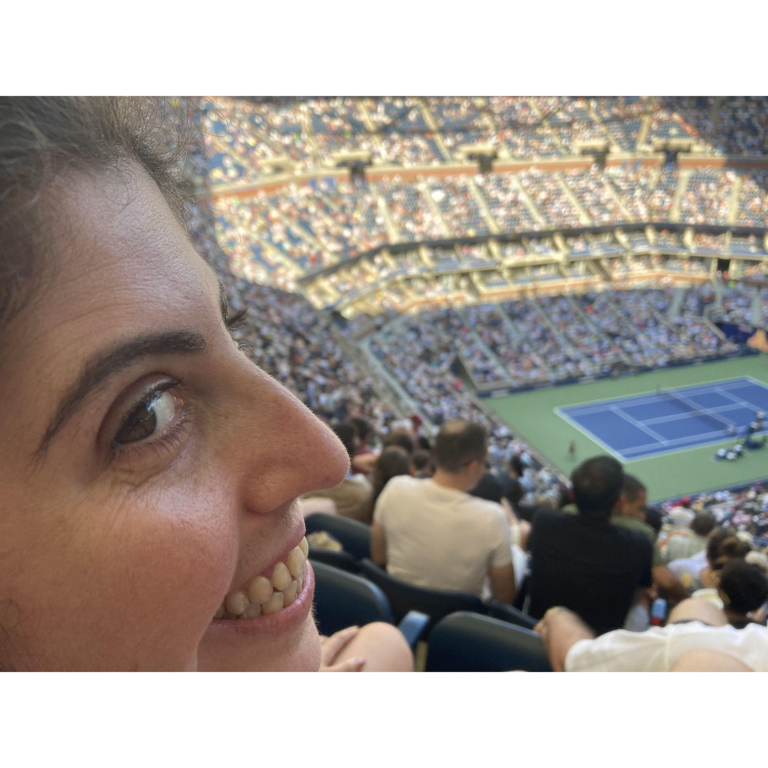Kevin's 30th birthday present for Sarah were tickets to the US Open. Sarah still says the day she saw Coco Gauff play in person is one of the best days of her life! Here's a photo of her in Ashe.