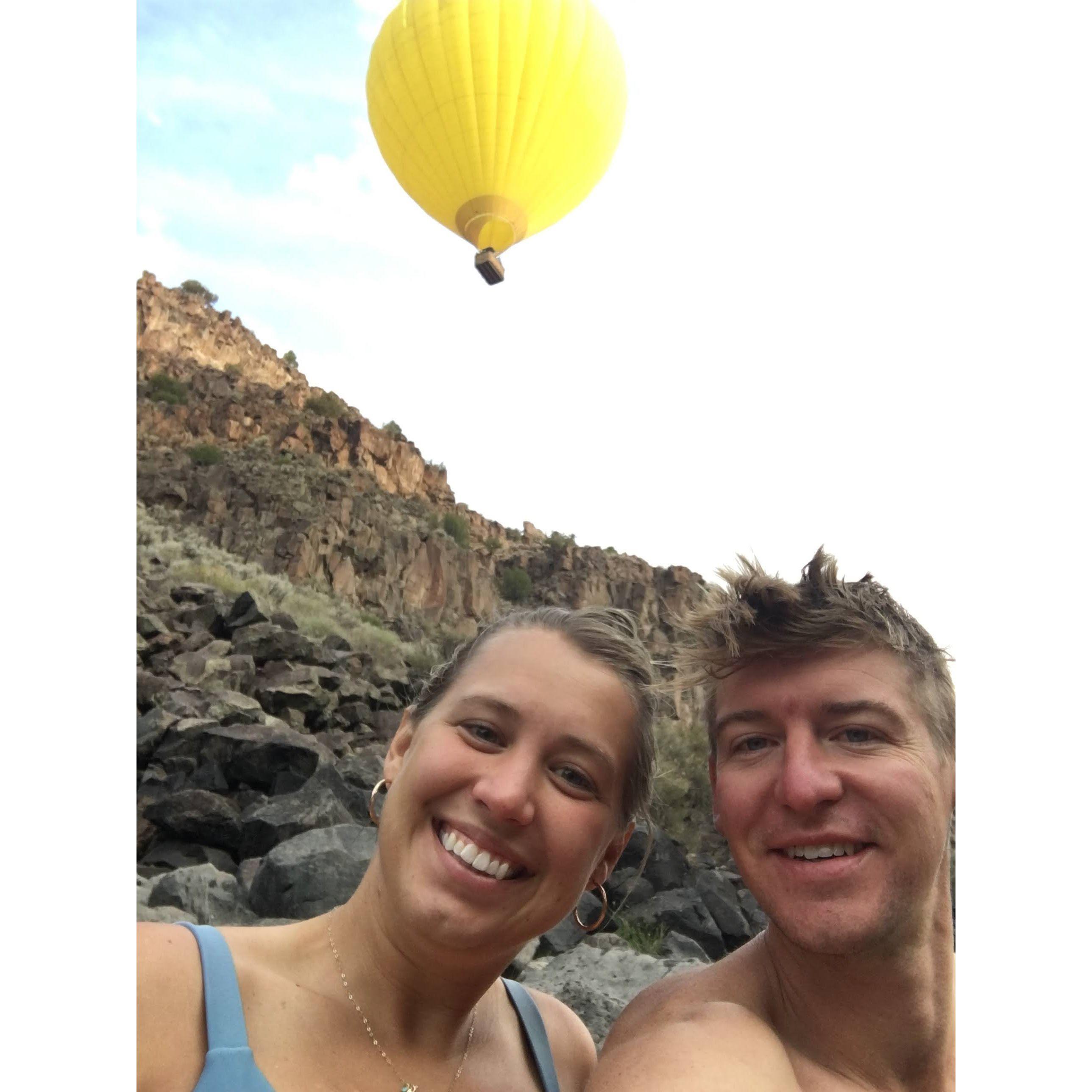 Chris and Hannah took a trip to New Mexico. This picture is from a Hot Springs where tons of hot air balloons were flying over. It was amazing!!