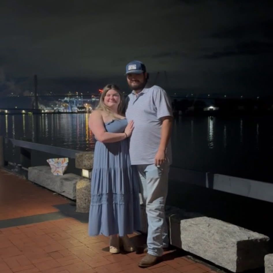 He proposed on River Street in Savannah, GA.