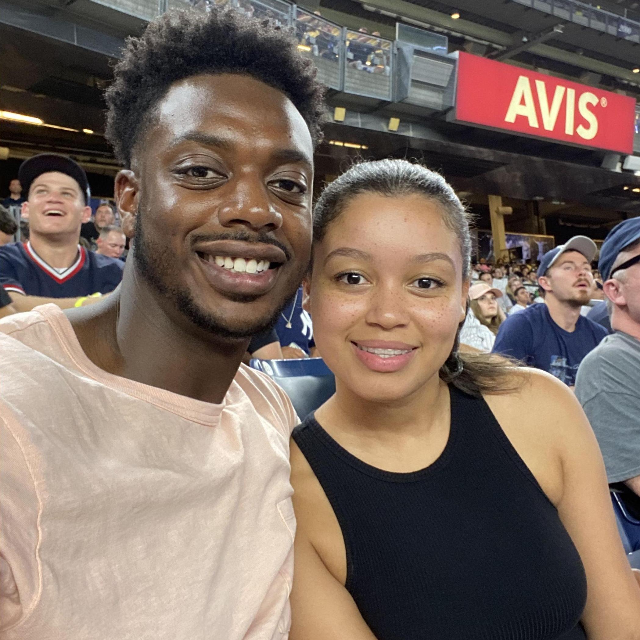 A snapshot of us at a Yankee's game, enjoying the excitement of the ballpark atmosphere.