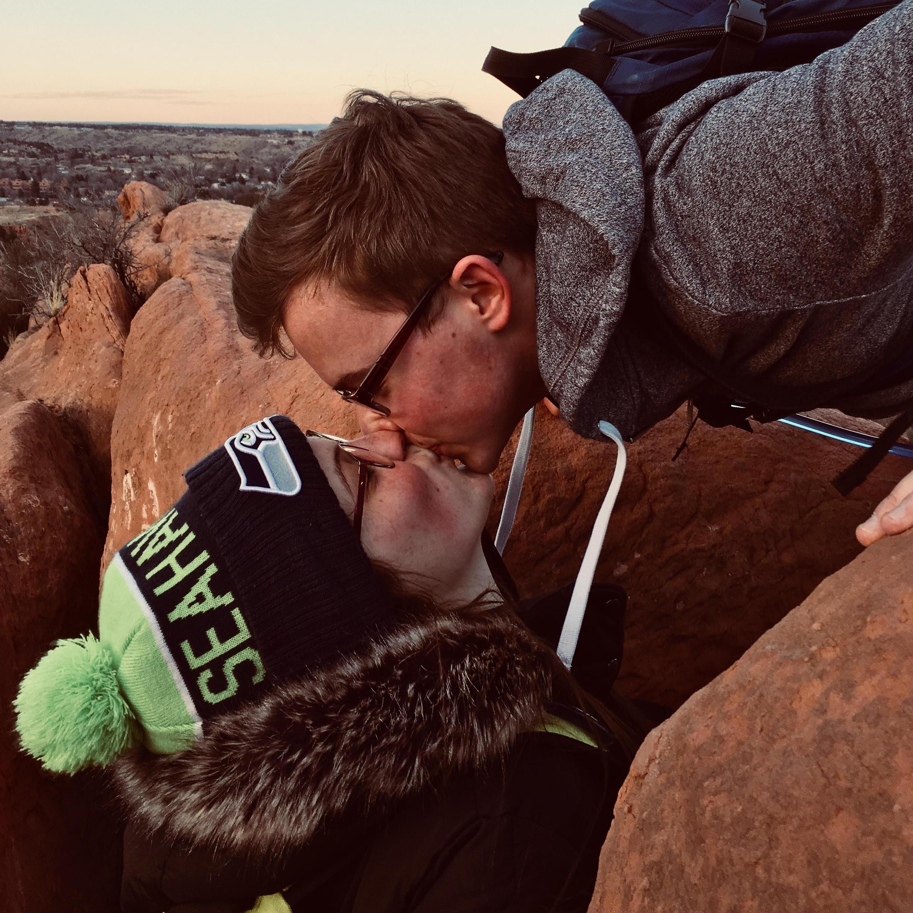 Kiss on top of the Red Rock Open Space ridge.