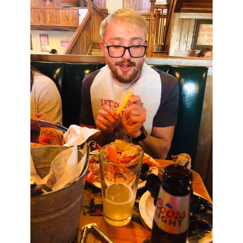 Please enjoy this picture of Sidney so incredibly happy eating a crab leg