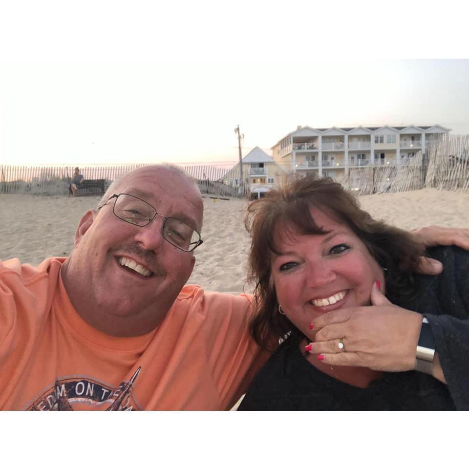 After the proposal at the Hotel Maria shown in the background.