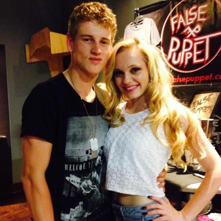 Our first photo together. Tyler forced me to take a picture with him after finishing his show.