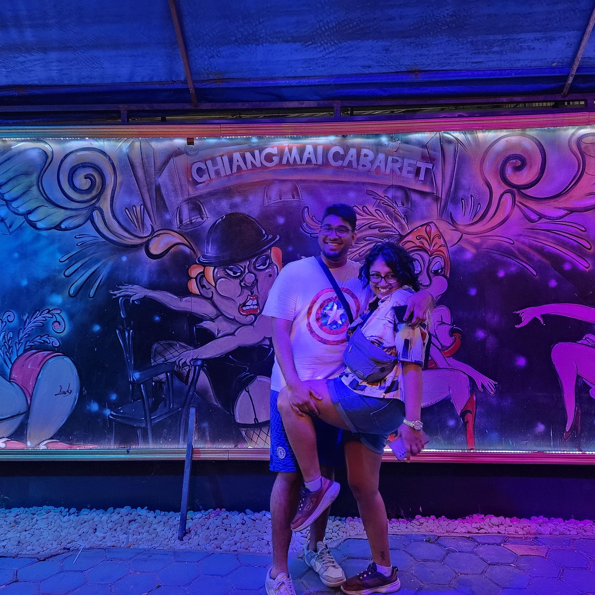 Us outside a drag show in Thailand - a fun night!