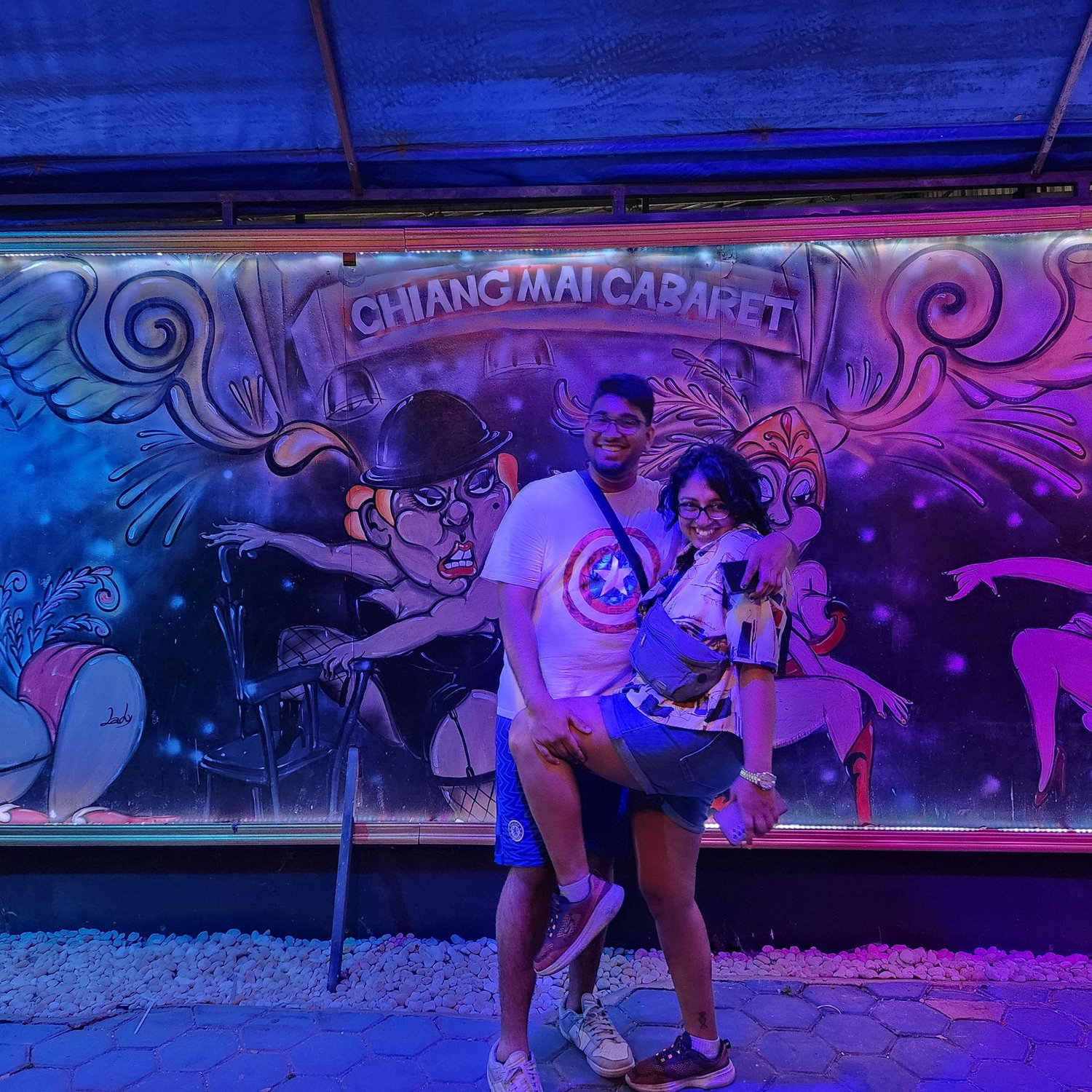 Us outside a drag show in Thailand - a fun night!