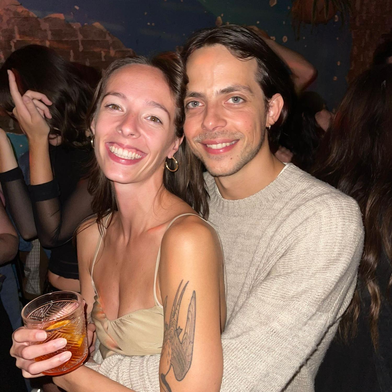 A moment from their engagement party taken by a friend who took the very first picture of Brooke and Krisz as a couple