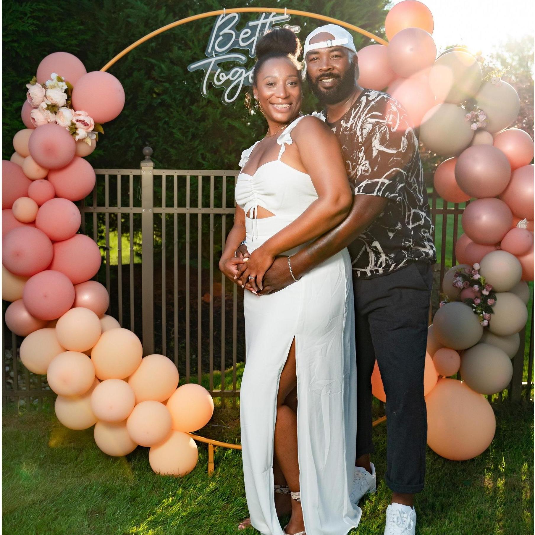 This pic is from our engagement party in August. We were so nervous there would be rain. It turned out to be a beautiful, HOT summer day.