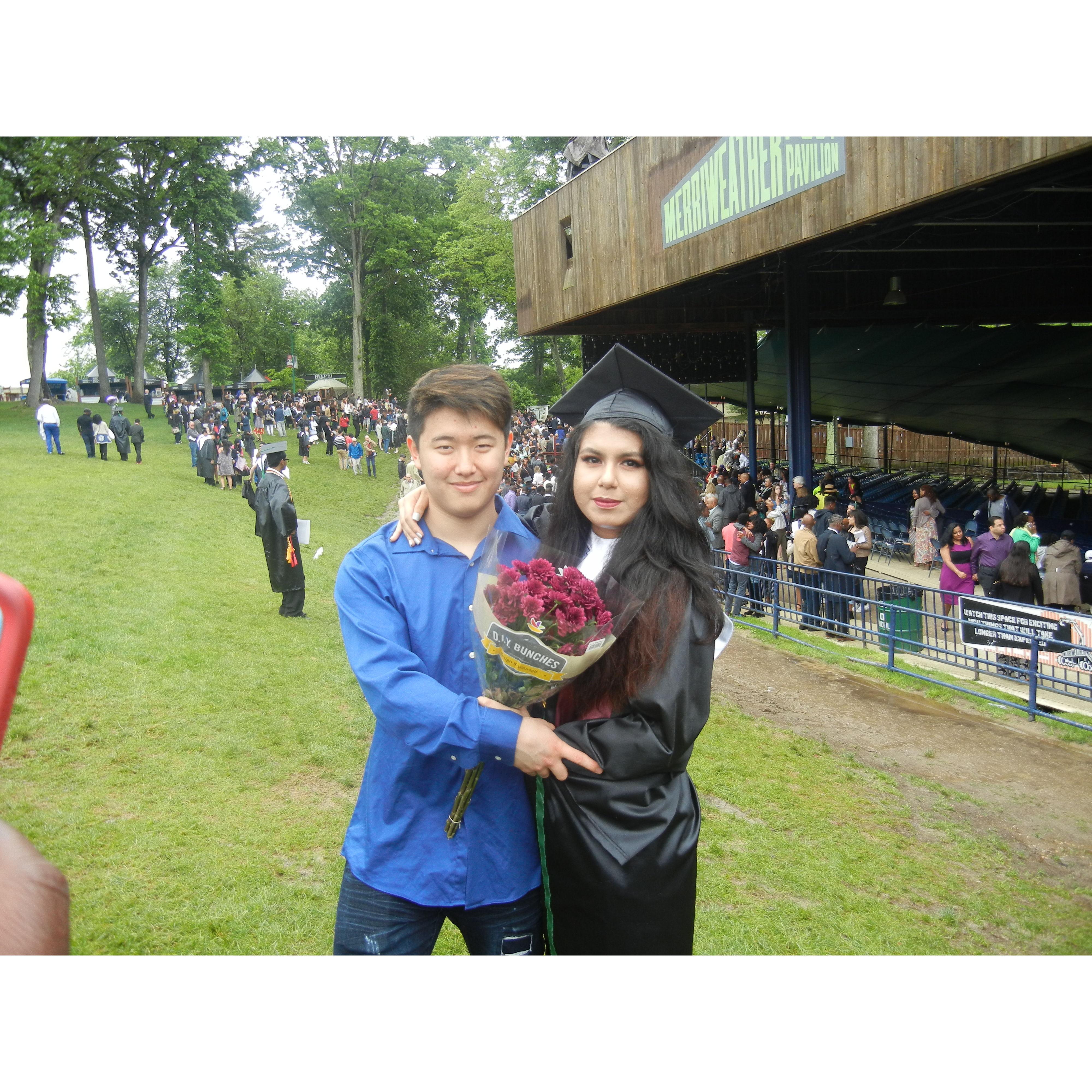 High school sweethearts at graduation.