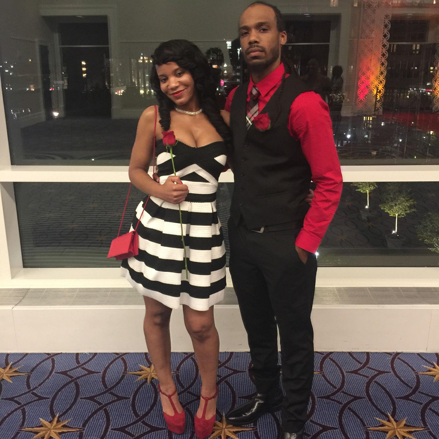2016 Dtlr regional manager meeting where the theme was Ties and roses and secretly I was five months pregnant in this picture and nobody else knew that but us.