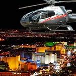 Maverick Helicopters tour over city