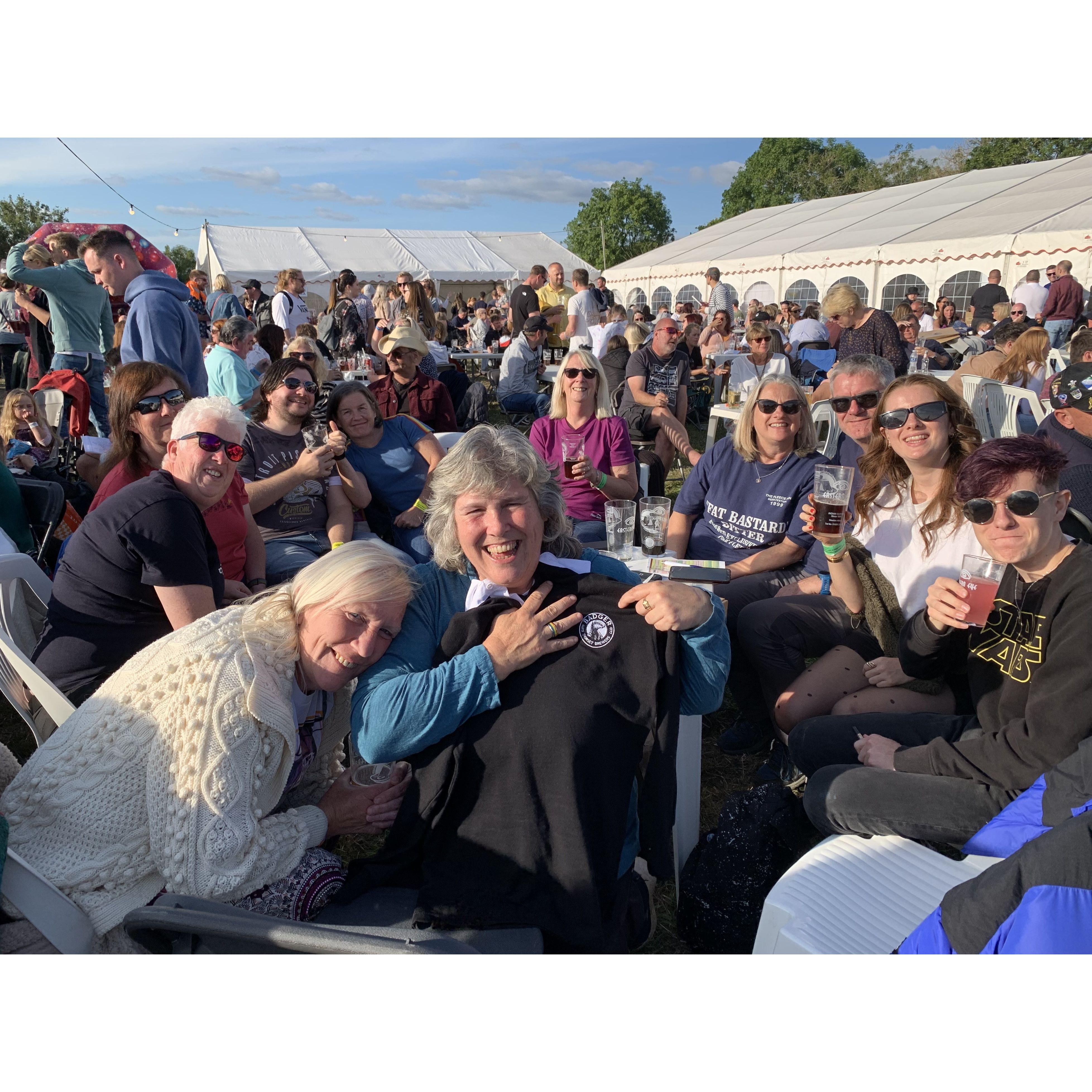Festival with Friends -
Claire gets a 'Badger' Beer Shirt - pleased to see her nickname in writing!