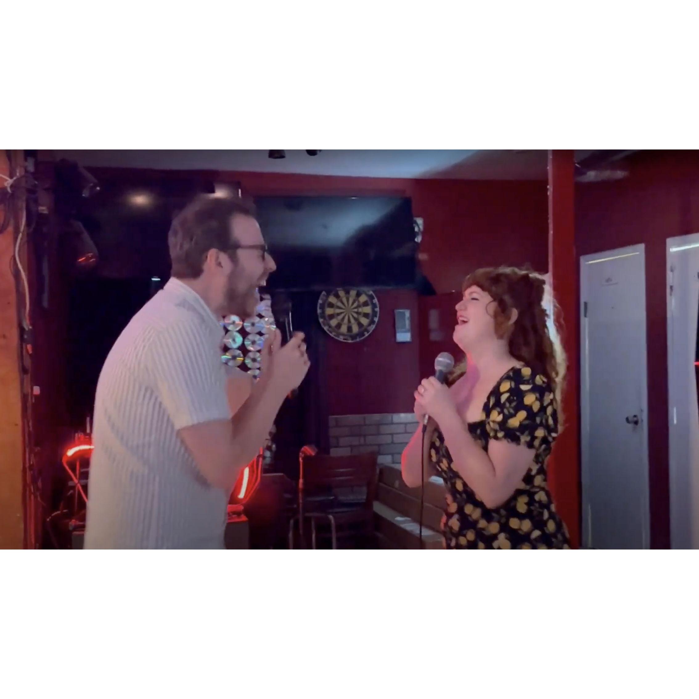 Singing Weezer at karaoke the night we got engaged.