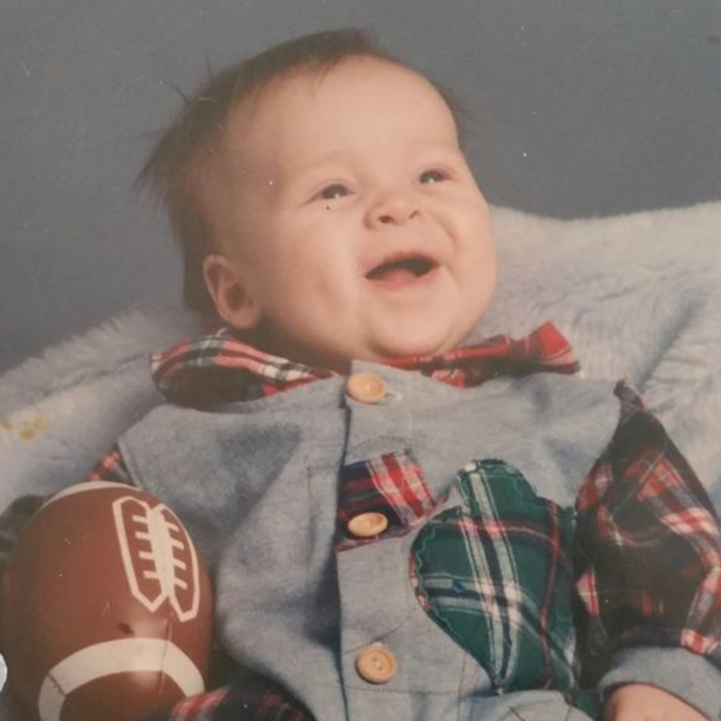 Baby Jacob, football in hand and heart.