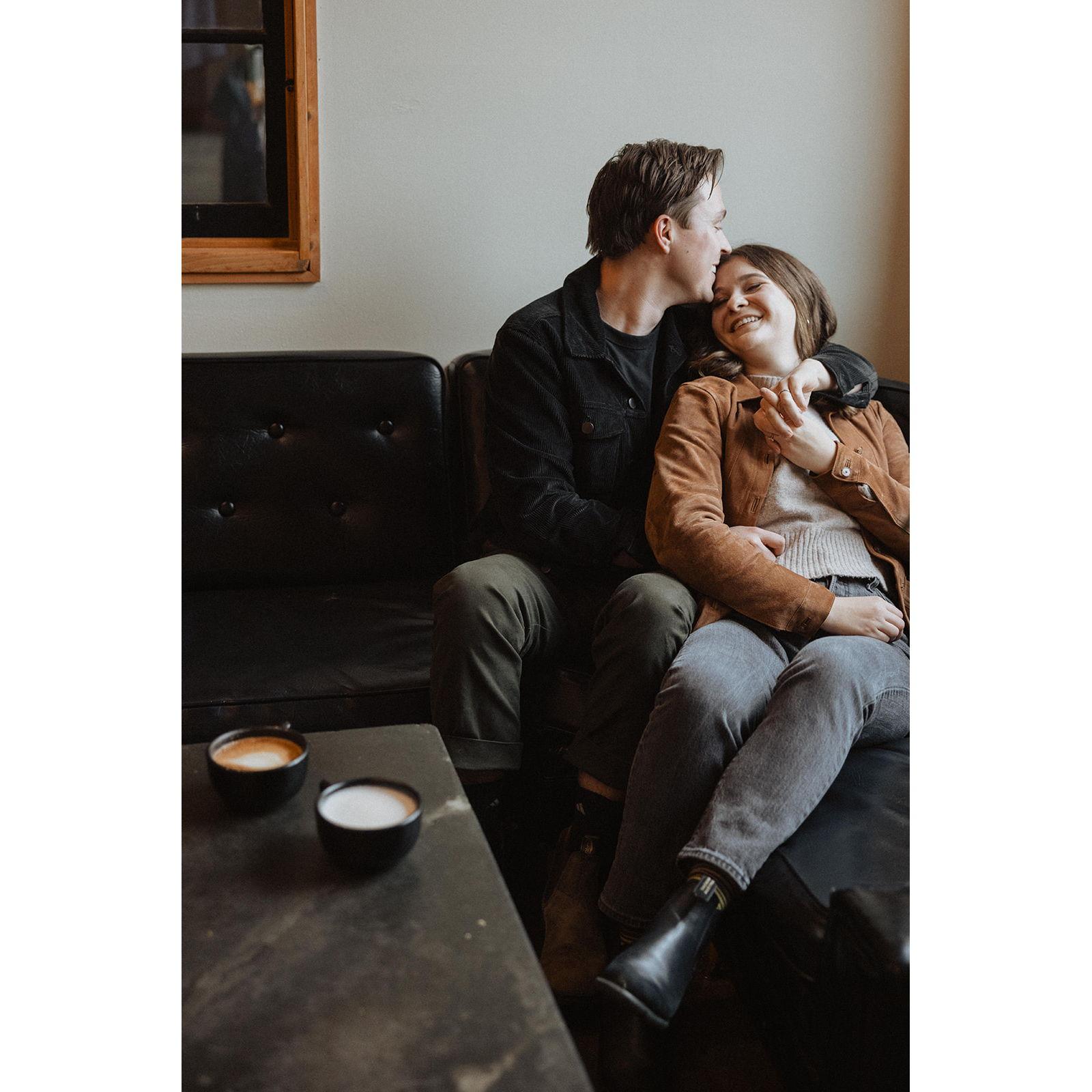 Engagement photos by In the Alpenglow at Bluebeard Coffee Roasters on a rainy day in Tacoma, Wahington in the fall of 2023.