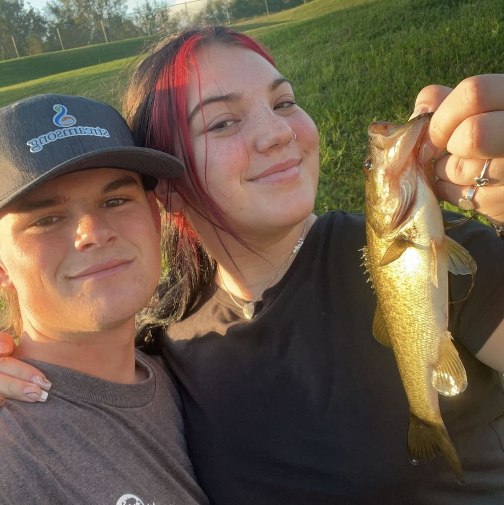 Jake somehow convinced me to hold a fish!