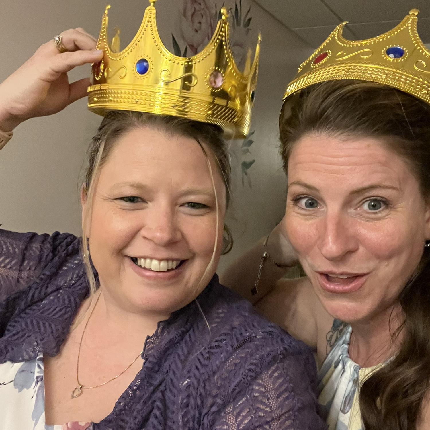 Katie and Susie crown themselves.