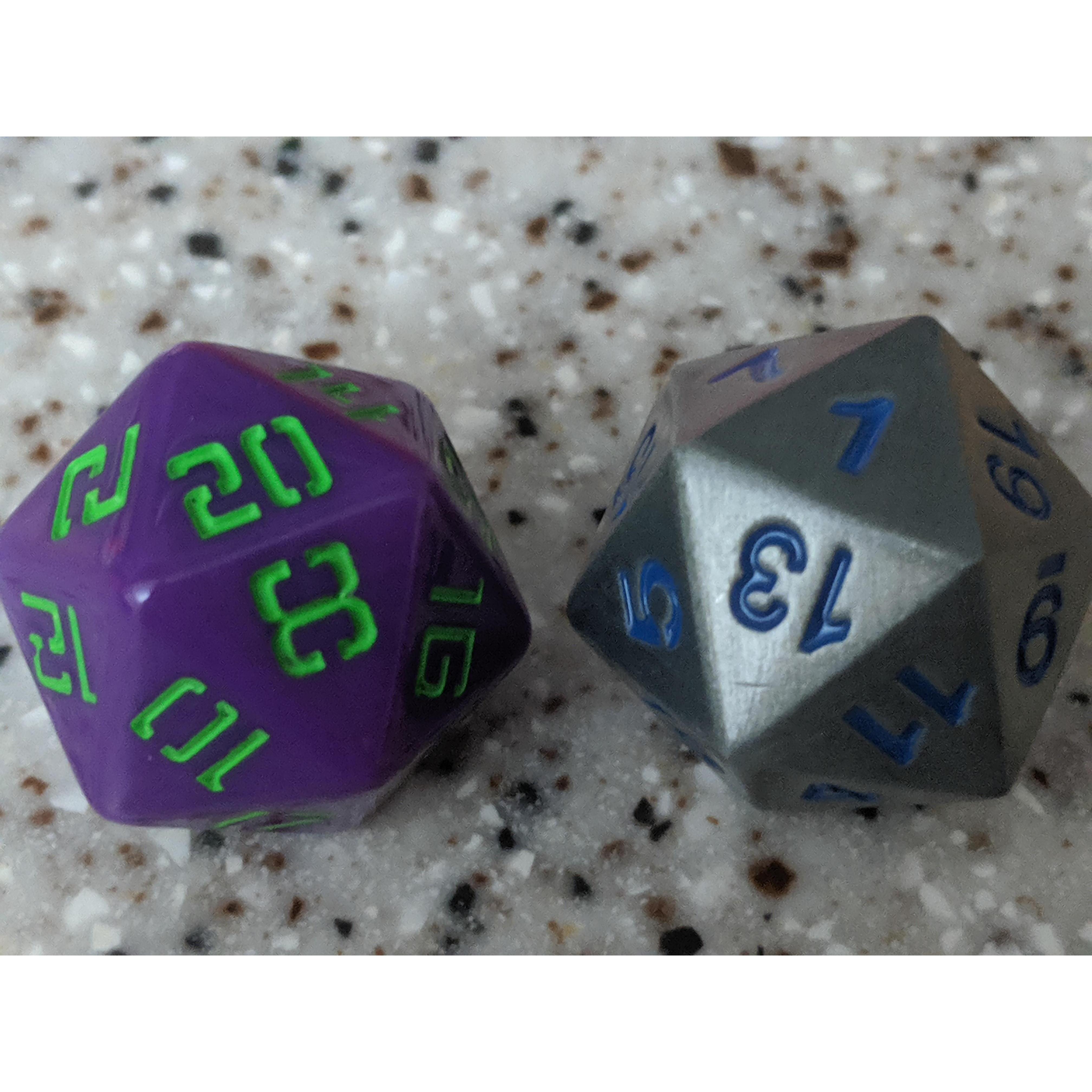 Sariah and Chris are avid tabletop roleplayers. Here is set of our favorite dice. Sariah's on the left and Chris's on the right.