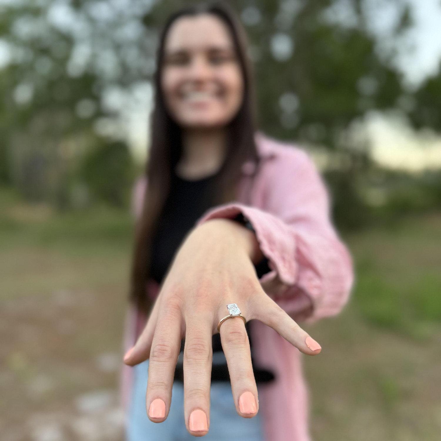 The first time trying on the ring!