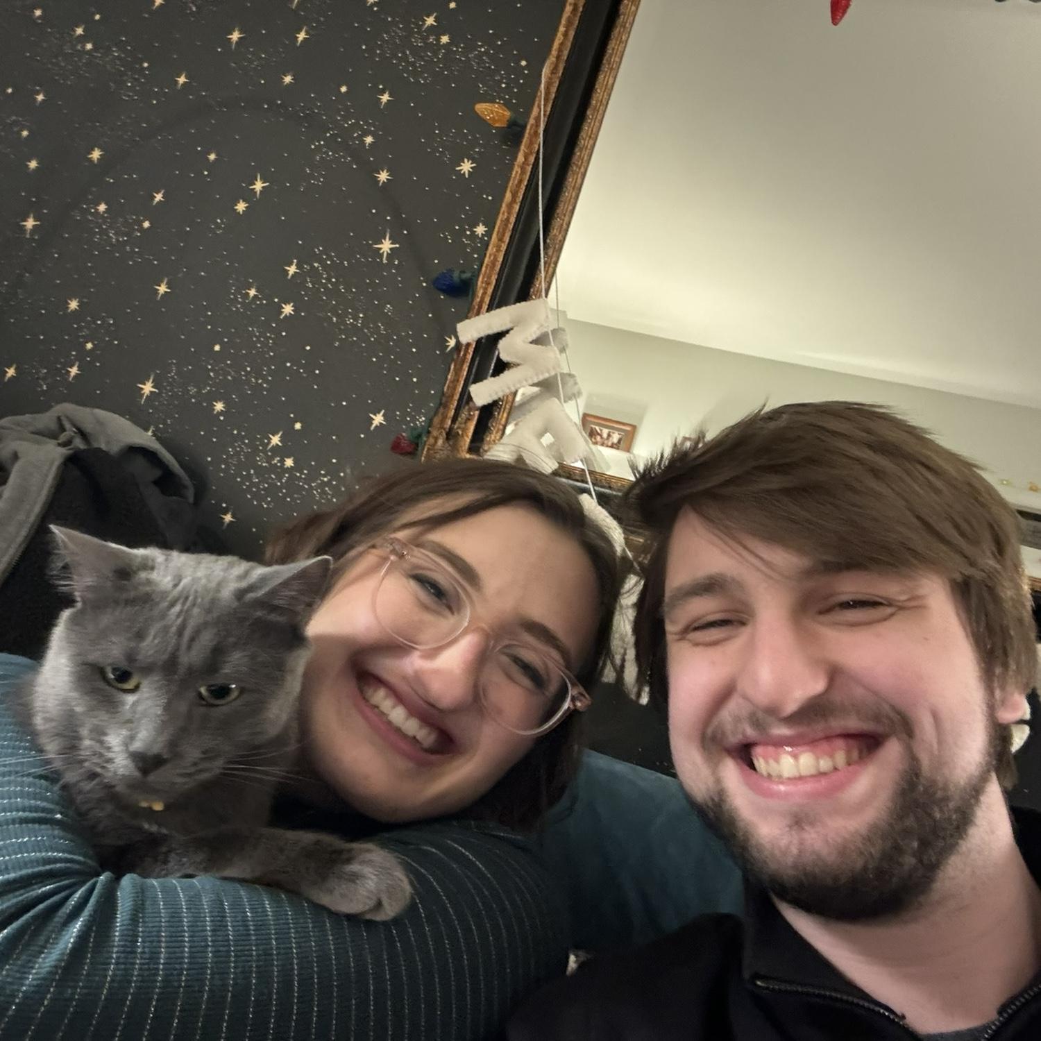 Our first selfie together, featuring Lauren’s cat, Dino.
