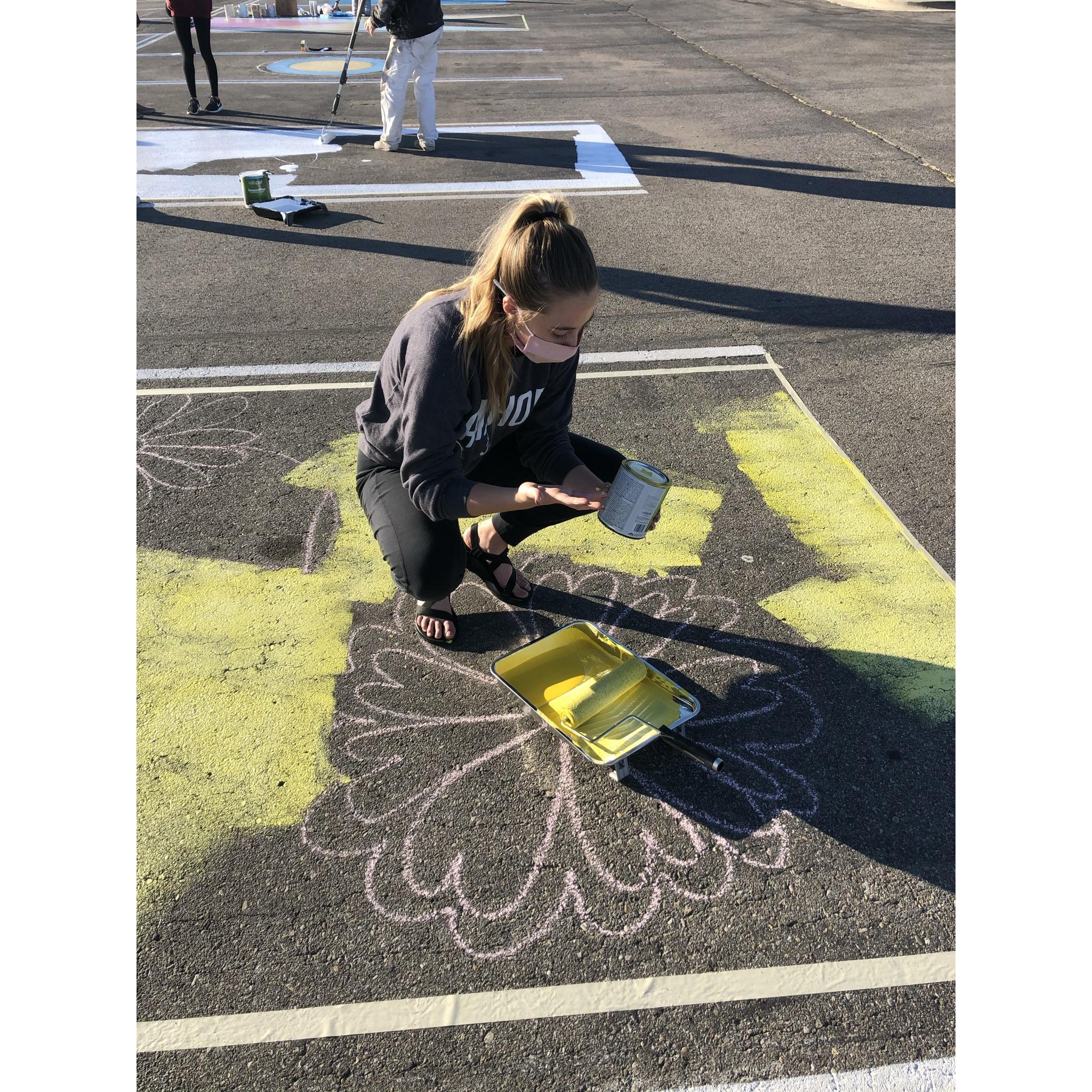 We painted parking spots next to each other senior year of high school! It was a blast! 2020