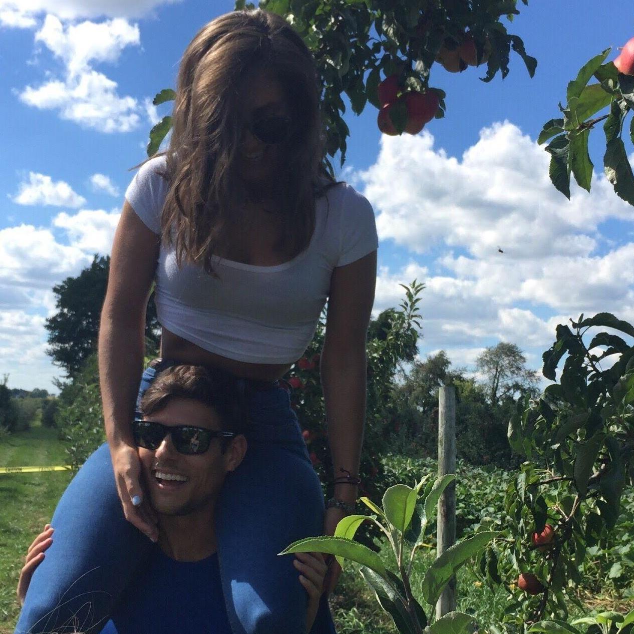 Adam's first trip to Edward's Apple Orchard. Very visual representation of his support of me.