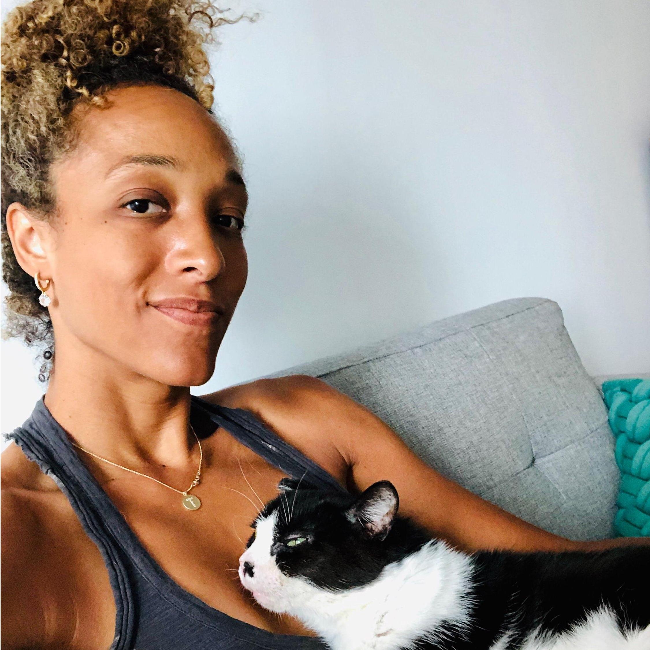 Traci & her cat " Brooklyn", who she found on the streets of Brooklyn in Crown Heights. Best Cat Ever!