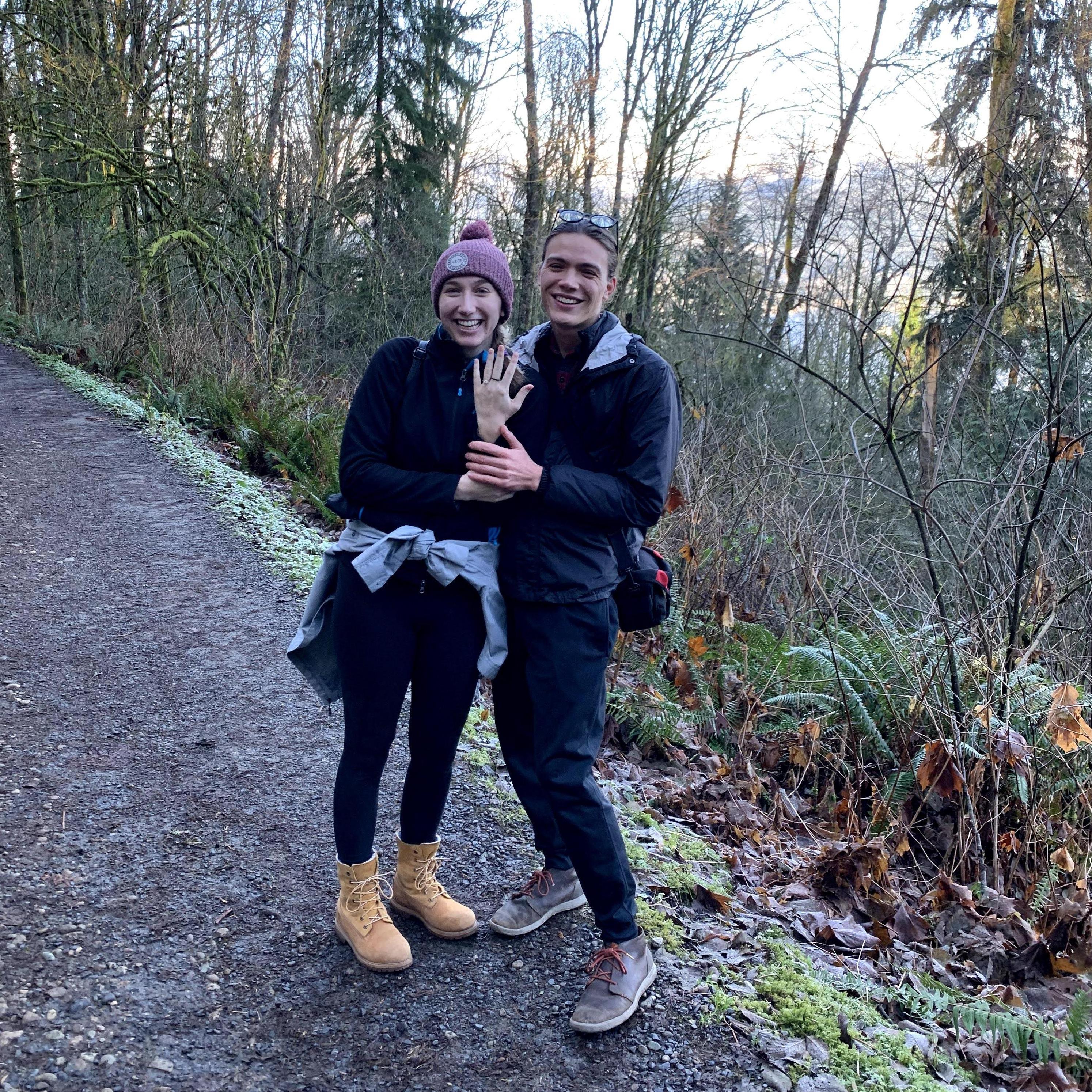 We're engaged! Photo taken 5 minutes after Jameson popped the big question. Photo taken by a lovely woman enjoying her Saturday hike :)