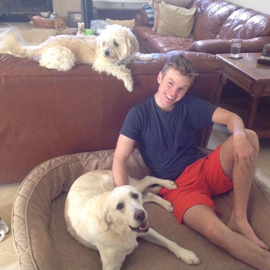 The puppies love Jeff
