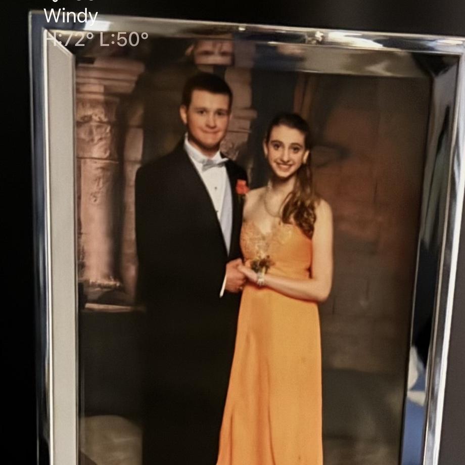 Brian kept this photo of Prom on his dresser all these years. It was still there in his childhood home bedroom when they got together.