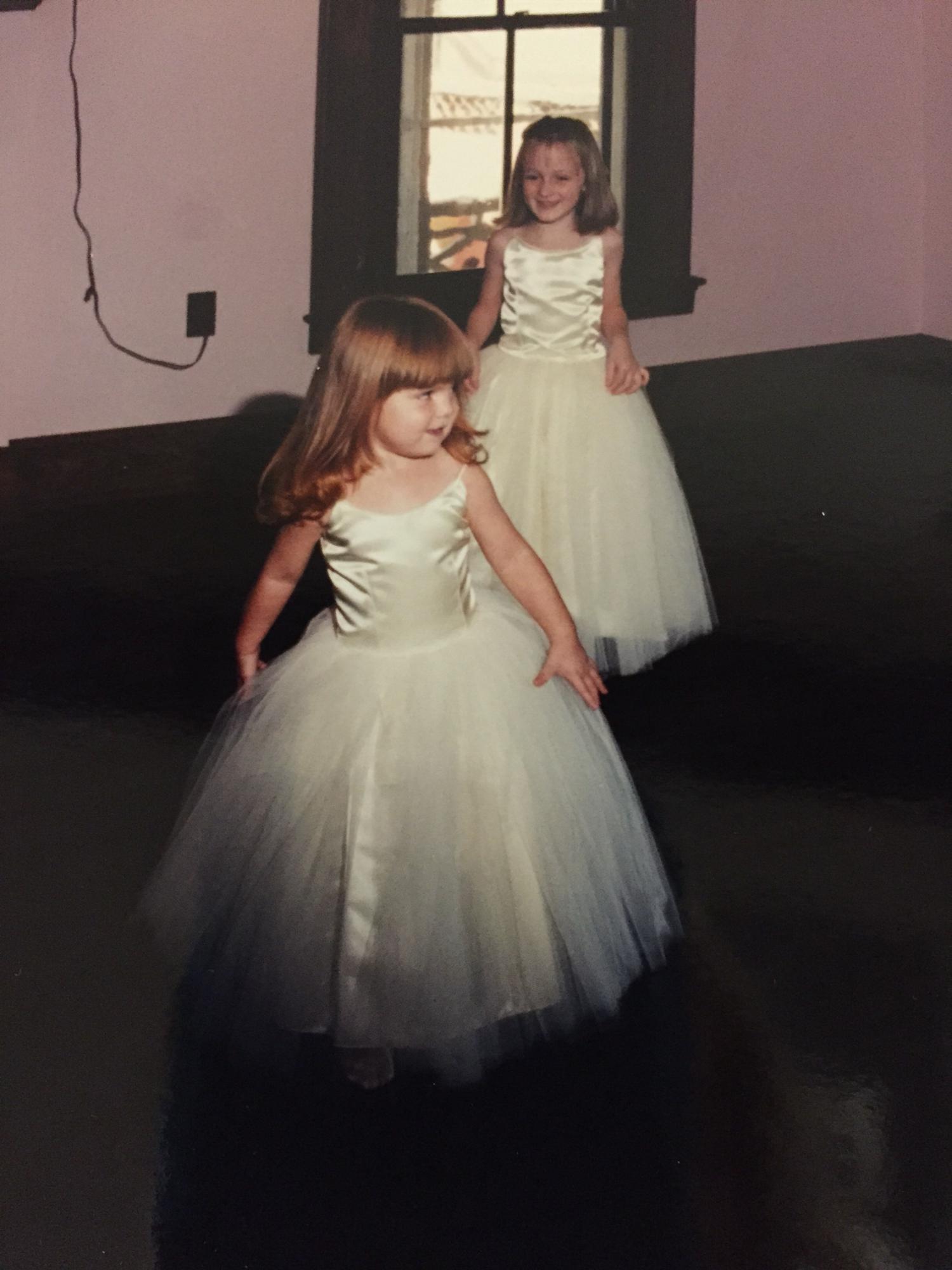 Lea and her cousin as flower girls