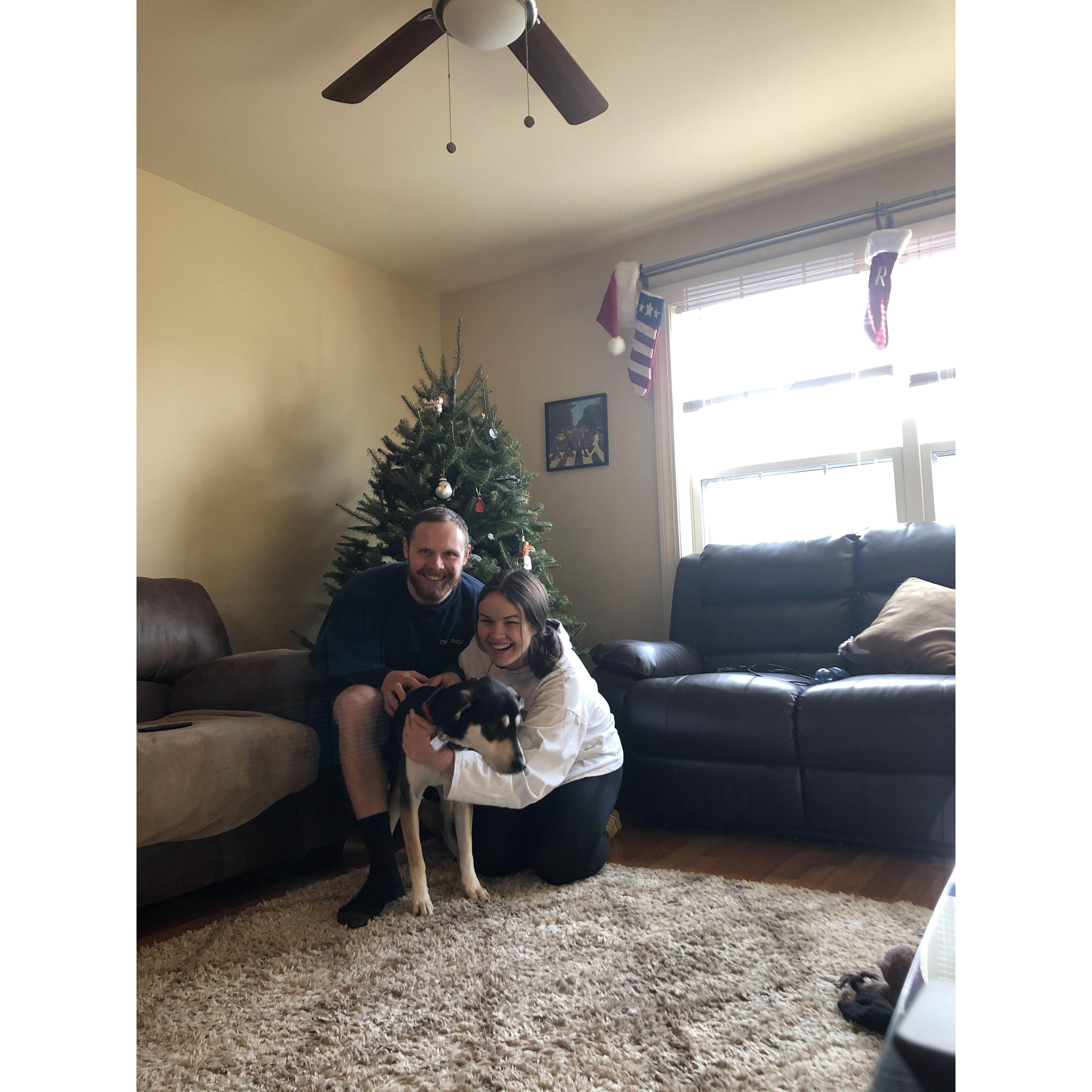 December 2019: Trying to convince Raye to take our annual Christmas card photo.  This is what life with Raye is like in a nutshell.