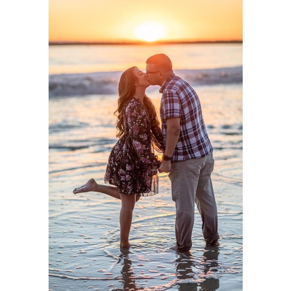 A classic 'kissing-under-the-sunset' photo.