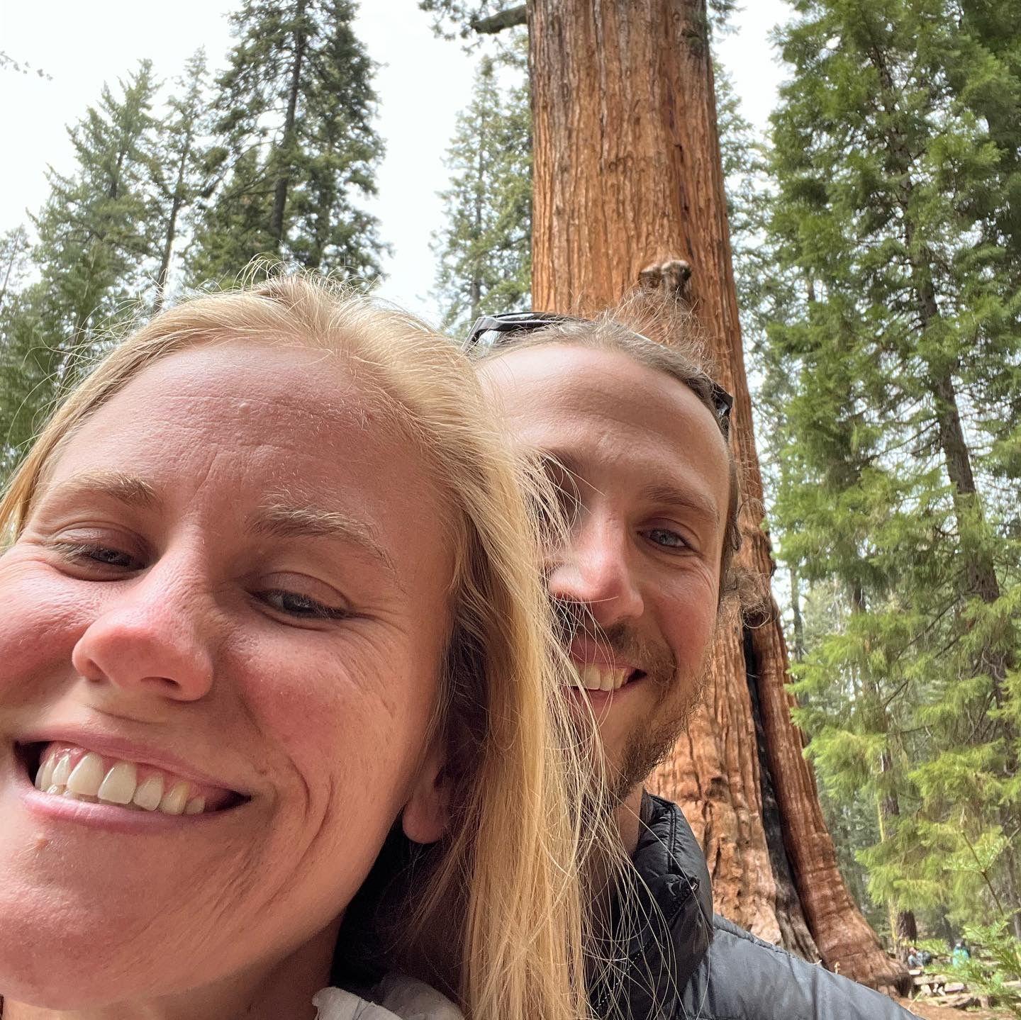 Smiling with the largest tree (by volume) in the world!
