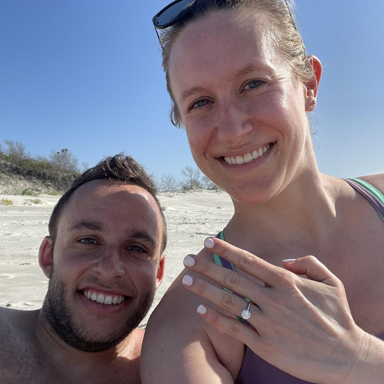 Moments after Marc popped the question at Sunset Beach, NC!