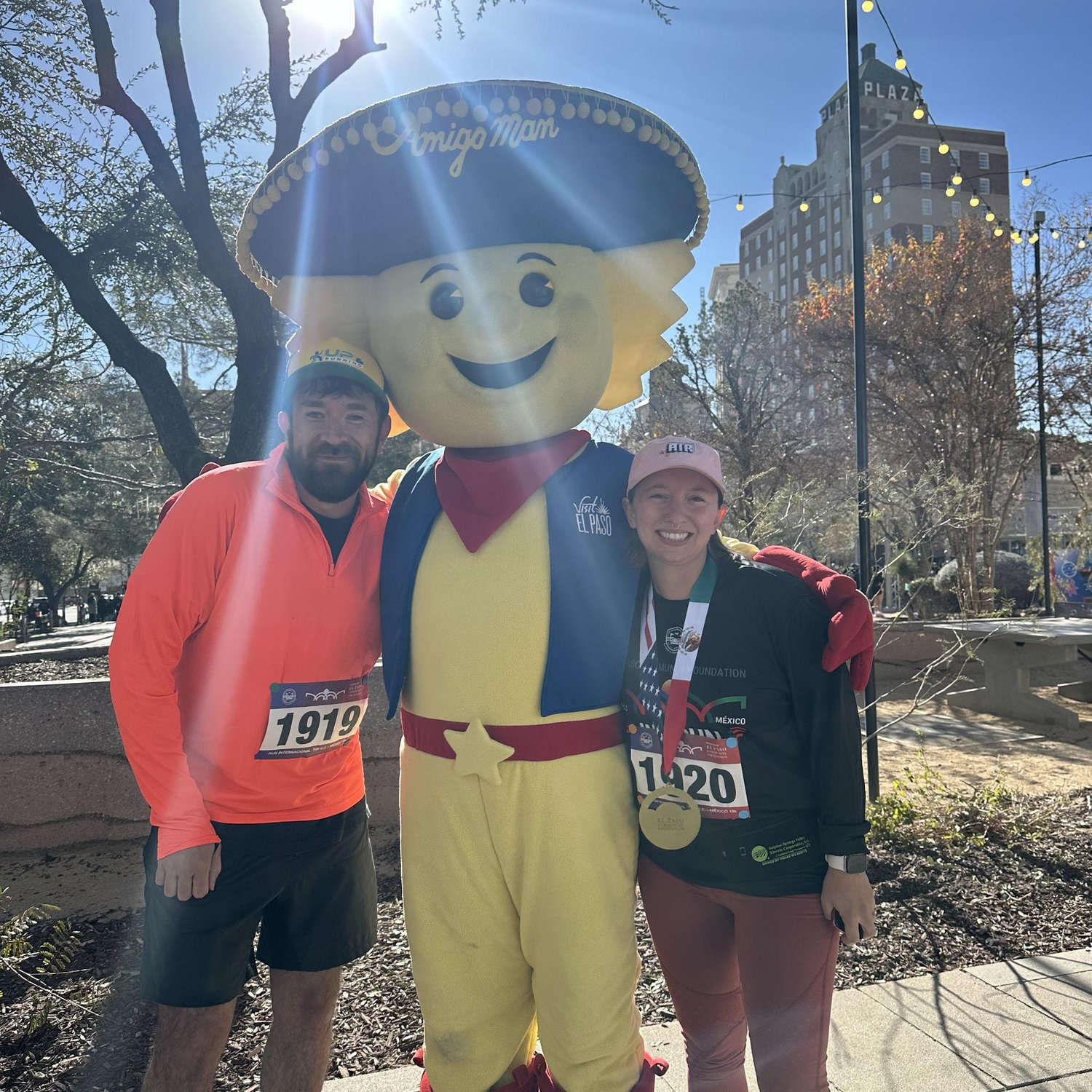 posing with local legend The Amigo Man after running the international 10k, which crosses the border to our sister city Juarez and back!