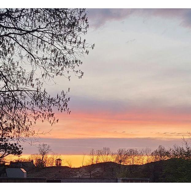 We're getting married under a beautiful sun set.