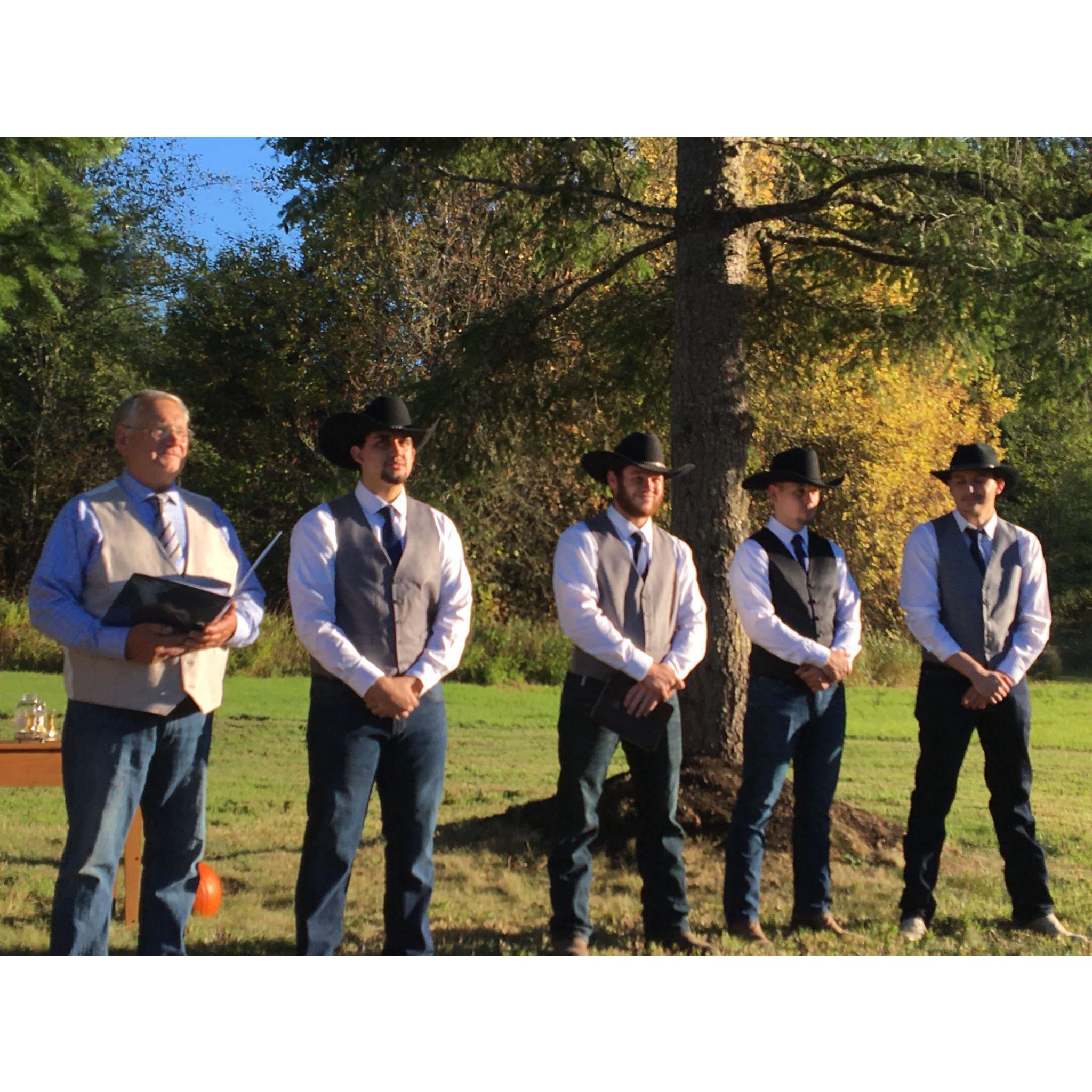 Groom and groomsmen during ceremony