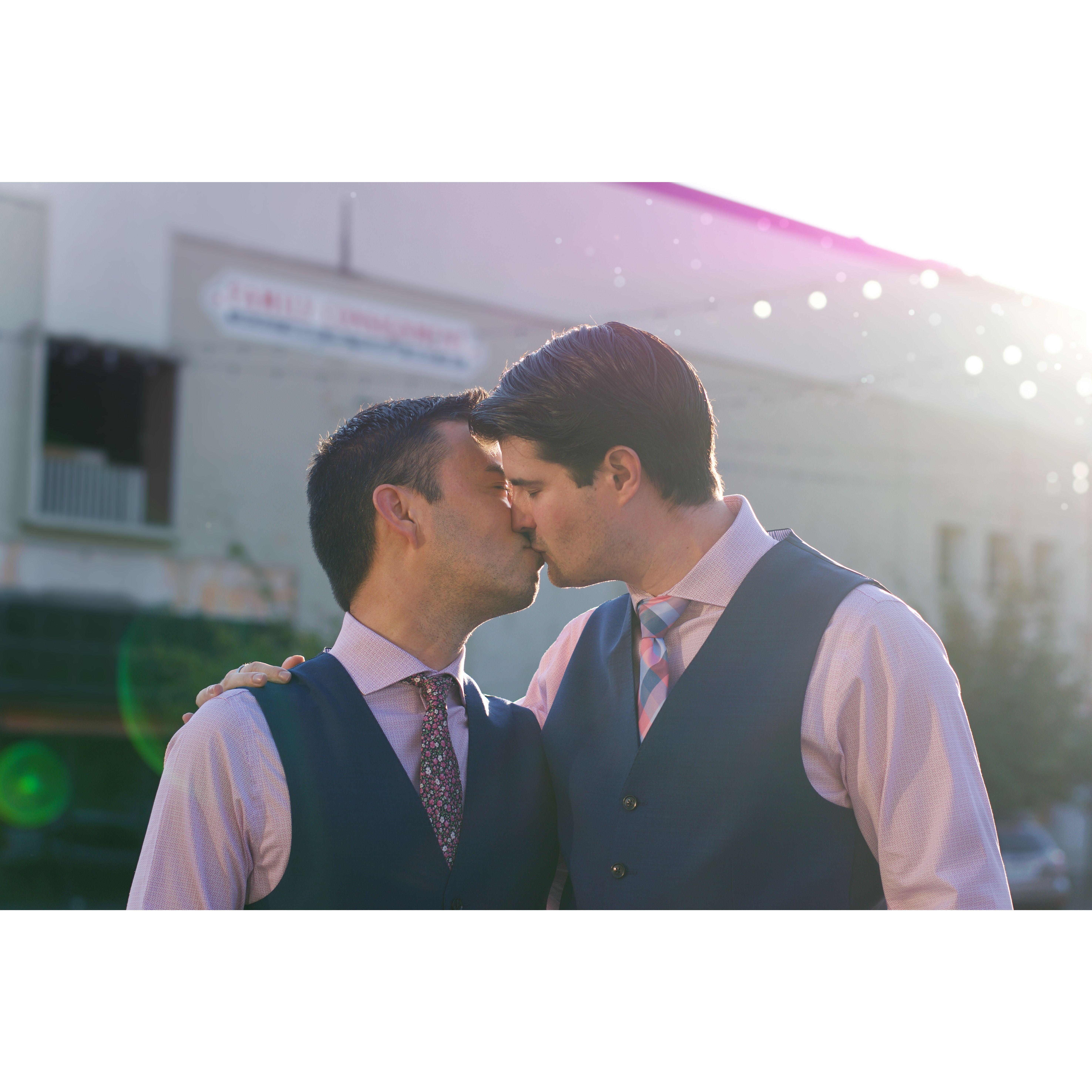 Enjoying a kiss in the middle of the road.