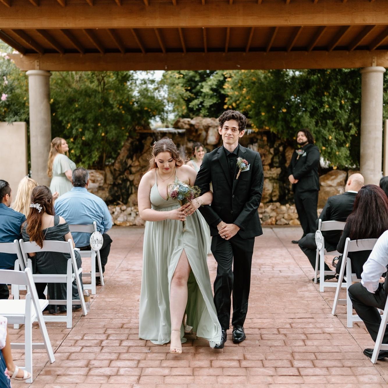 our first time walking down the aisle together, august 2022