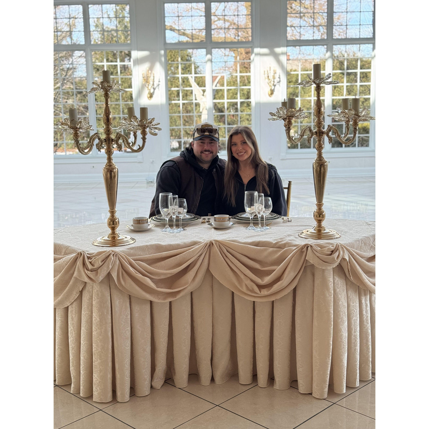 We toured our first wedding venue together at the beginning of 2025....before we were engaged