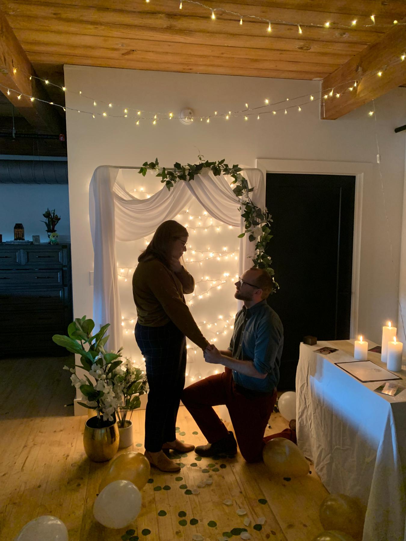 Our proposal! Mitch was able to keep everything a surprise and decorated our apartment with hand-drawn pictures and photos of us. Bridesmaid Raven Althouse was there to capture this special moment!