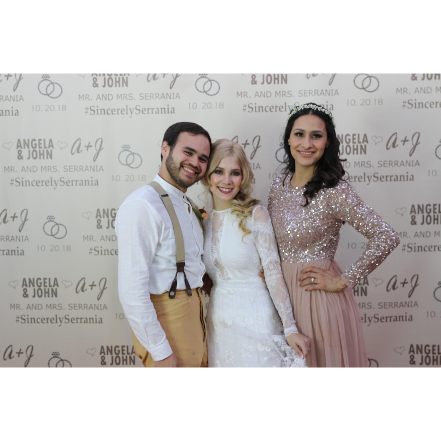Groomsman Jorge Soriano and Bridesmaid Adriana Mulero with The Bride, Angela Serrania