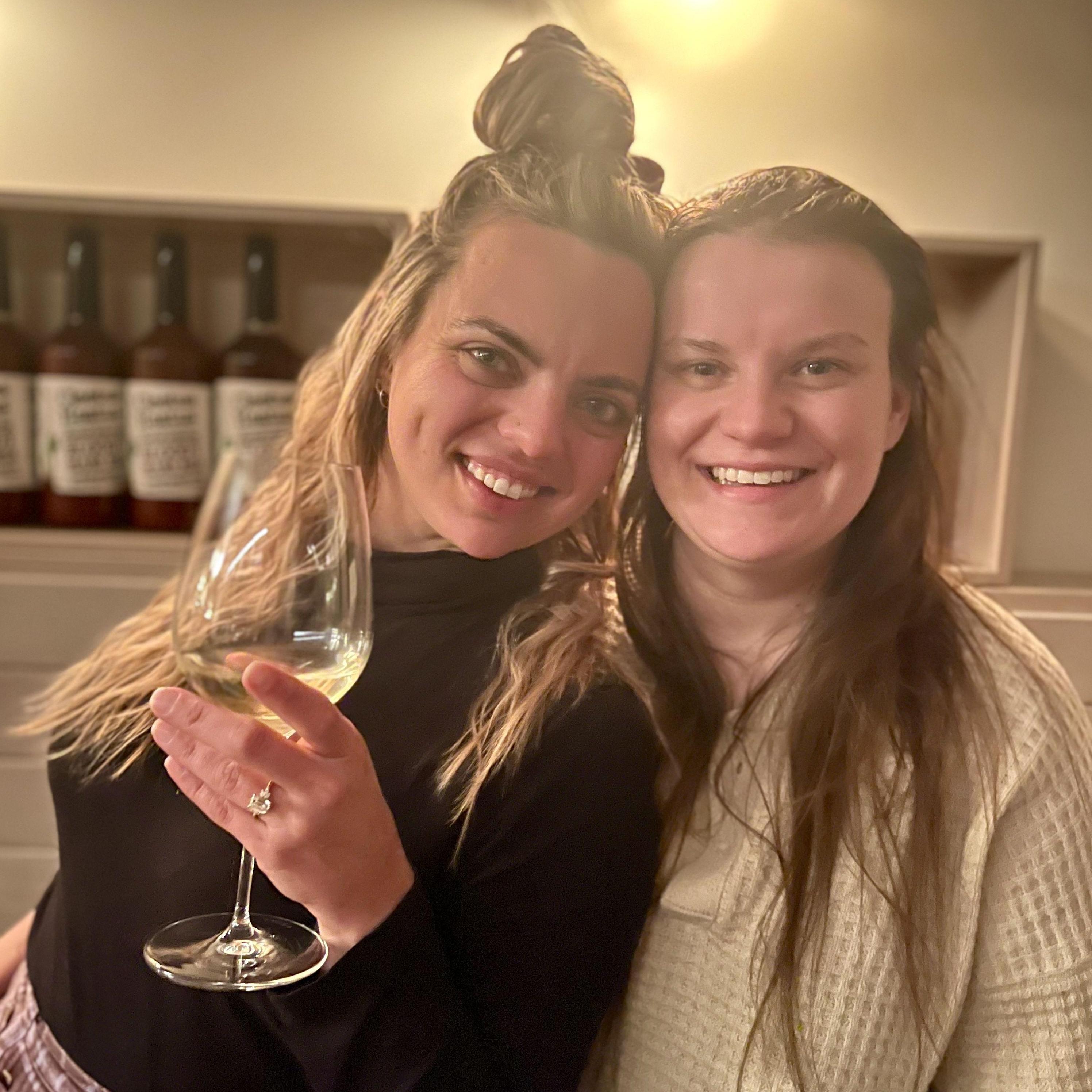 The day Charlotte proposed! The best way to show off a diamond is holding a glass of wine, of course. (December 3, 2022)