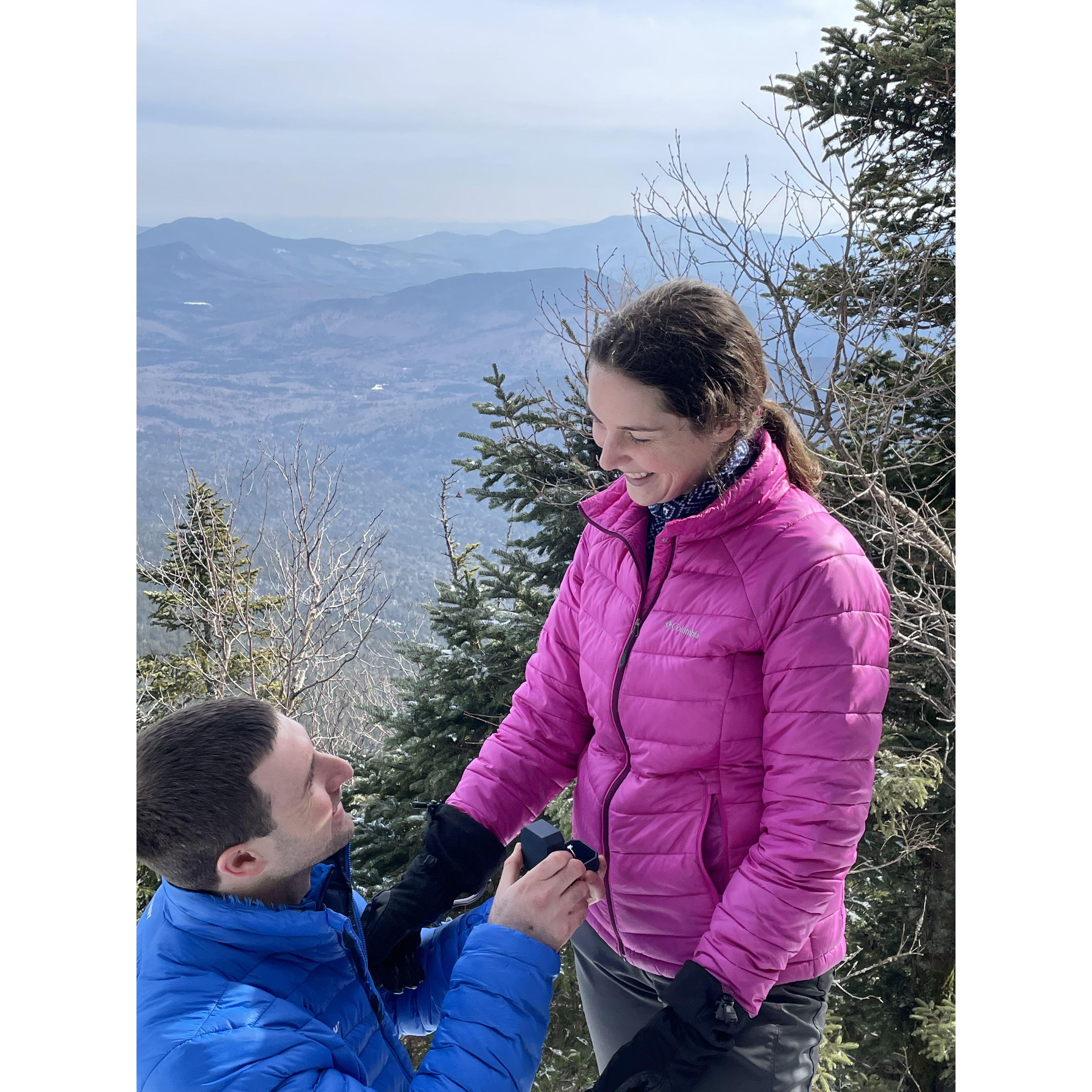 On top of Mt. Hancock, Lindsey said yes!