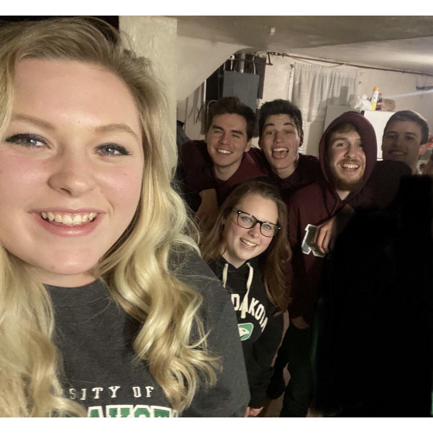 This is one of the very first photos we have together, taken in 2019. We called this the "trap house", it was a dingy little college house basement we used to hang out in with our friend group.